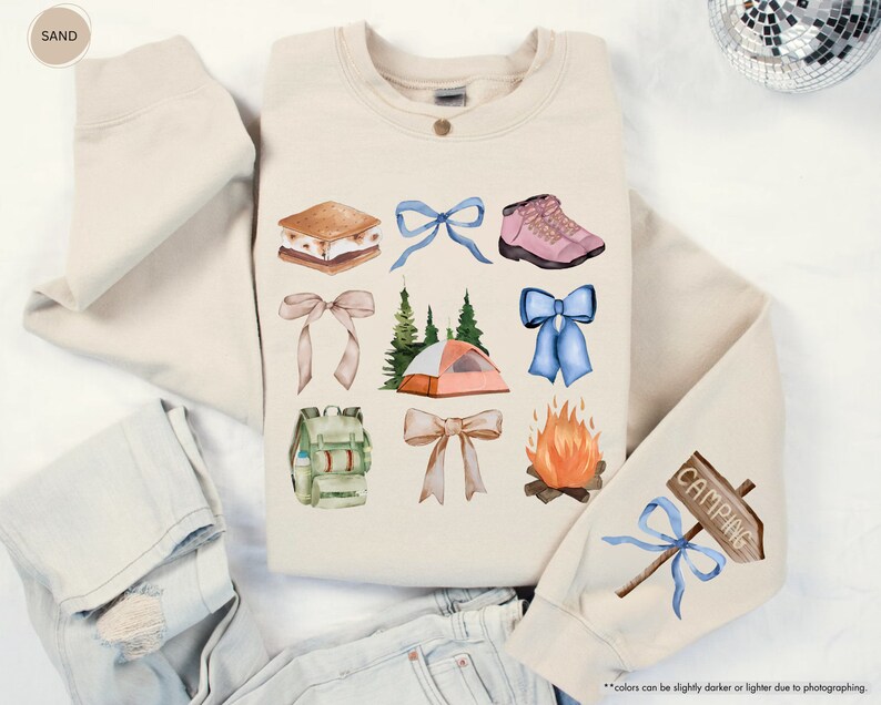 a pair of jeans, a sweater, and a pair of shoes are laid out