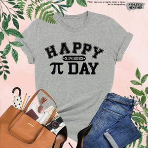 May include: A gray t-shirt with black text that reads "HAPPY 3.14.2025 &pi; DAY".