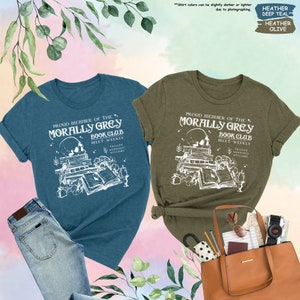 two t - shirts and a purse on a floral background