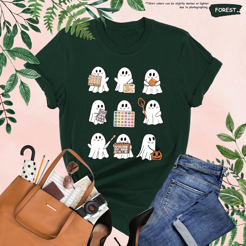 a t - shirt with a bunch of ghost on it