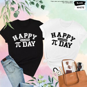 May include: Two t-shirts, one black and one white, with the text "HAPPY &pi; DAY - 3.14.2025" printed on the front.