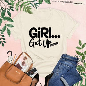 a t - shirt with the words girl get up on it