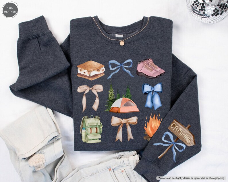 a pair of jeans and a sweater with patches on them