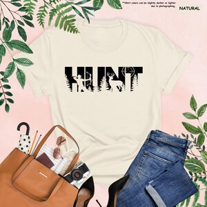 a white shirt with the word hunt on it