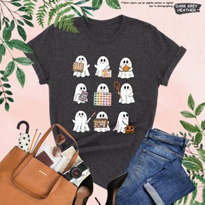 a women's t - shirt with ghost pictures on it