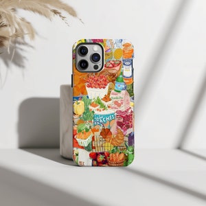 May include: A colorful phone case with a collage of grocery items, including fruit, vegetables, bread, and dairy products. The case features a white background with a variety of colors and textures.