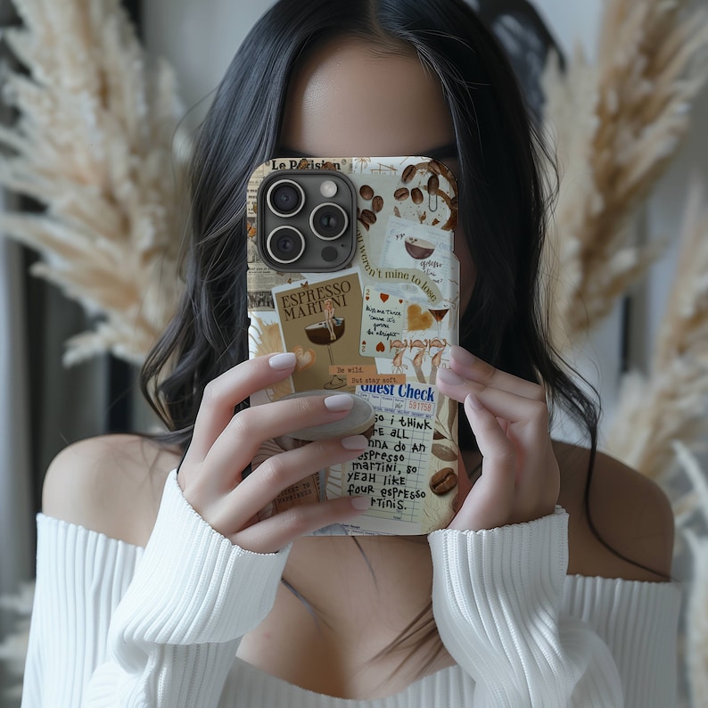 May include: A phone case with a collage design featuring coffee beans, coffee cups, and handwritten notes. The text on the case includes "Espresso Martini", "Guest Check", and "I think we all... four espresso tinis."
