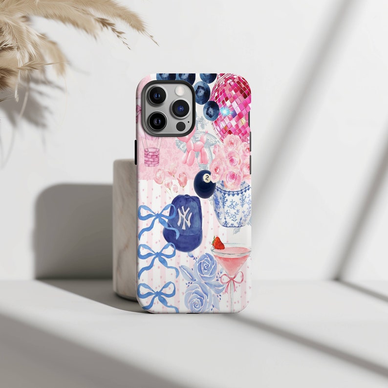 coquette collage phone case with graphics like bows, flowers, blueberries, pink disco, and drinks