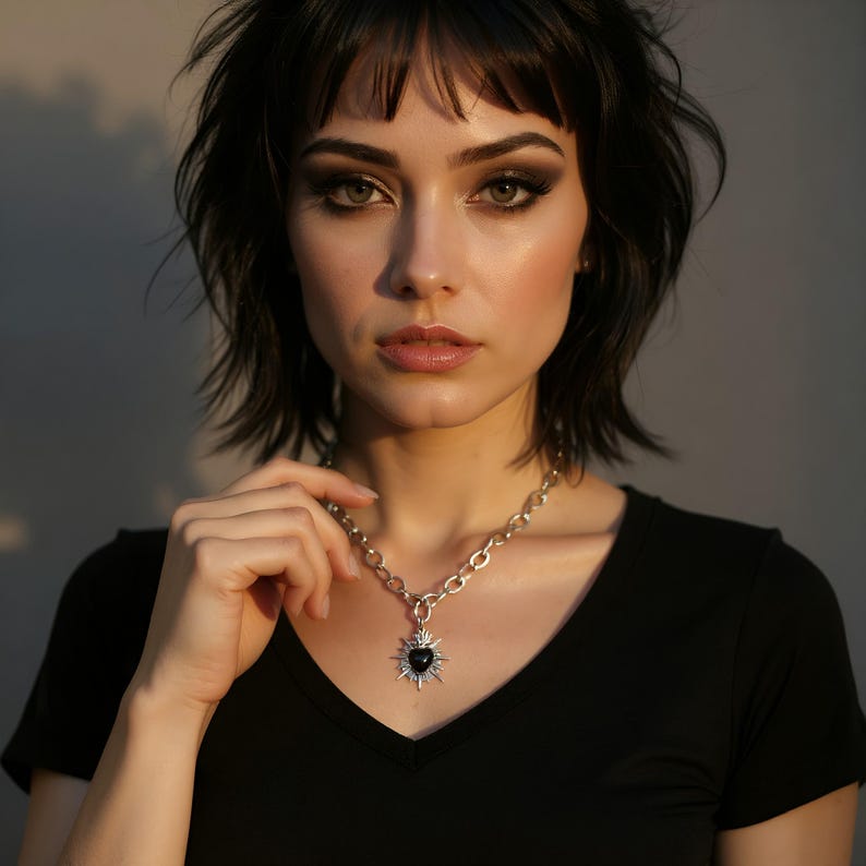 Our Thorn Heart Necklace, a stunning gothic necklace crafted with care and precision. This goth chain necklace features a striking black or red heart pendant wrapped in intricate thorn details, perfectly embodying alternative and edgy style.
Measuring approximately 16 inches in length with an Magnetic clasp. The pendant itself is compact yet bold, making a unique statement piece that enhances any gothic or punk-inspired outfit.