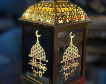 Ramadan lantern with light up candle inside gold