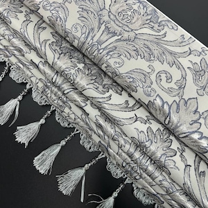 Elegant Roman Shade with Classic Pattern and Tassels