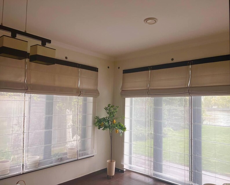 View of 10 Modern Drape Ideas to Elevate Your Living Room Instantly