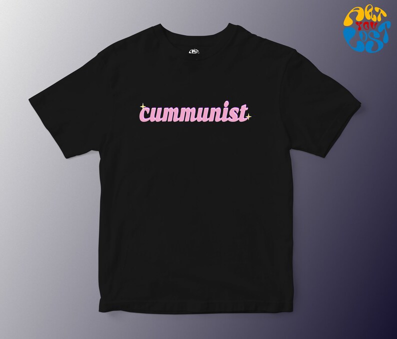 May include: Black t-shirt with the word "communist" in pink letters with a sparkle on each side.