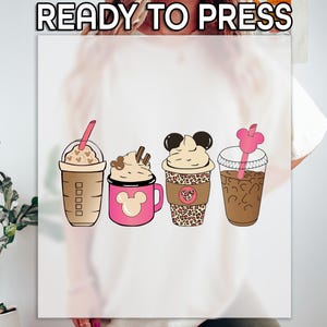 May include: A white background with the text "READY TO PRESS" at the top. Below the text are four cartoon beverages: a brown iced coffee, a pink mug with a mouse design, a leopard print cup, and a clear cup with a pink straw.