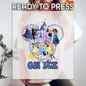 May include: White t-shirt featuring a colorful graphic of Disney characters, a castle, and the words "Disney On Ice." The design includes Mickey and Minnie Mouse, princesses, and the text "READY TO PRESS" at the top.