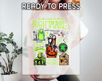 May include: White t-shirt with a colorful graphic design featuring characters and text from "The Nightmare Before Christmas." The text includes "Welcome to our Nightmare," "Bumpy Sleigh Ride," and "I'm your Nightmare."