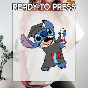 May include: A blue cartoon character wearing a graduation cap and gown, holding a diploma. The character has large eyes and a wide smile. The words "READY TO PRESS" are at the top of the image.