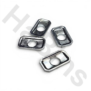 May include: Four rectangular metal washers with rounded corners and a central circular hole. Each piece features a raised border and a recessed center, finished in a polished silver-tone metallic material with a smooth, reflective surface.