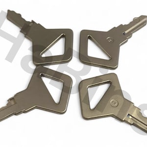 May include: Four silver-colored keys arranged in a square. Each key has a rectangular head with a triangular cutout and a toothed blade. The keys are on a white background.