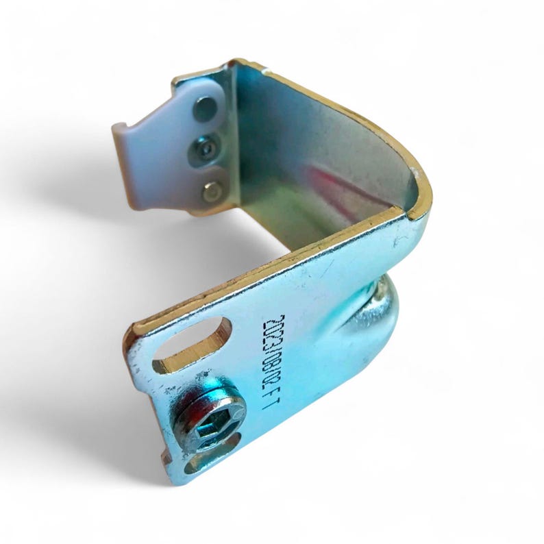 May include: A metallic silver-colored metal bracket with a curved design. The bracket has a rectangular base with a hexagonal screw and the date "2023/08/02 F1" printed on it. The bracket has a rounded section and a small, rectangular hook.