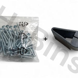 May include: A clear plastic bag filled with silver nails and a black rubber door stop. The nails have flat heads and are pointed at the end. The door stop is wedge-shaped with a ribbed surface.