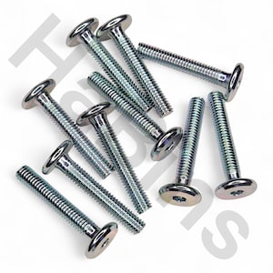 May include: A collection of silver-colored, round-head bolts with threaded shafts. The bolts have a flat, circular head and a hexagonal socket. The bolts are scattered on a white background.