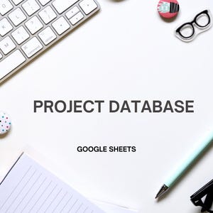 May include: A white desk with a keyboard, a notebook, a pen, and a pair of glasses. The text "PROJECT DATABASE GOOGLE SHEETS" is written on the desk.