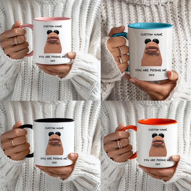 May include: Four white ceramic mugs with different colored interiors and handles: pink, blue, black, and orange. Each mug features a cartoon face, the text "CUSTOM NAME" and "YOU ARE PISSING ME OFF".