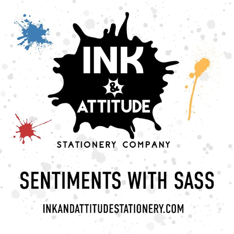 The image is a promotional graphic for a stationary company called "Ink & Attitude Stationery Company". It features a splash of ink splatters and the company's name in bold, black text. The company's slogan "Sentiments with Sass" is also displayed in the image.