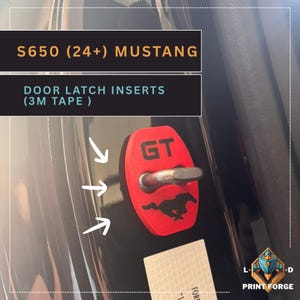 May include: Red door latch insert with "GT" text and a black Mustang logo. The text "S650 (24+) MUSTANG" and "DOOR LATCH INSERTS (3M TAPE)" are in the image. The insert is attached to a black car door.