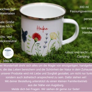May include: White enamel camping mug with a floral design and the name "Heike" printed on the front. The mug has a blue rim and a capacity of 300 ml.