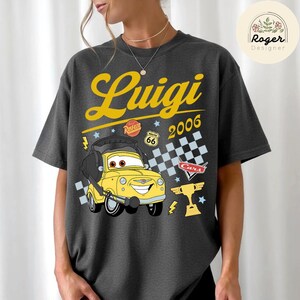 May include: A set of three ceramic mugs with a speckled, matte finish. The mugs are in shades of cream, light gray, and dark gray. Each mug has a simple, minimalist design, perfect for coffee or tea.