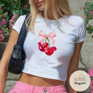 Coquette bow Mickey Cherry baby tee, Disney Pink bow shirt Baby tee, WDW Disneyland Girls trip Croptop Baby Tee womens T-shirt, Girly Tee