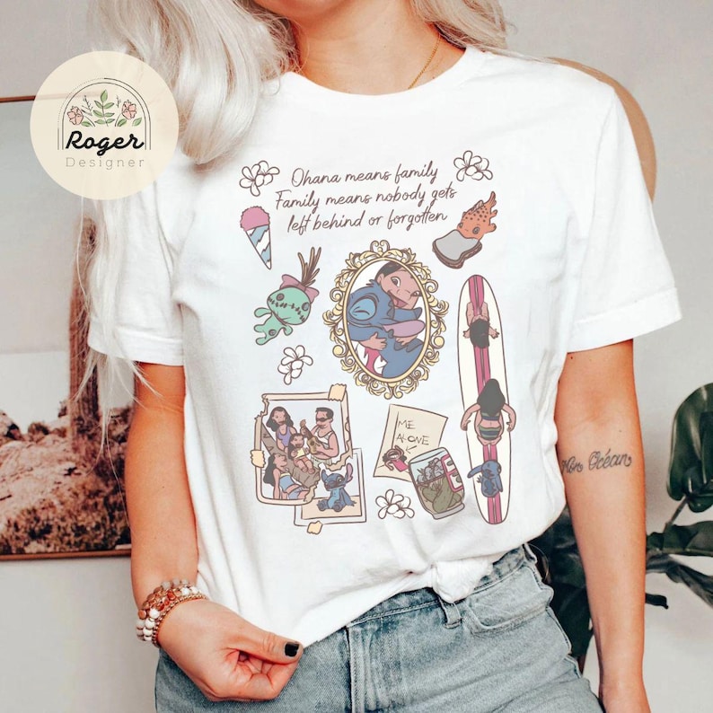 K&ouml;nnte beinhalten: Wei&szlig;es T-Shirt mit farbenfrohem Aufdruck. Das Design enth&auml;lt den Text "Ohana means family. Family means nobody gets left behind or forgotten" und Illustrationen von Charakteren und Szenen.