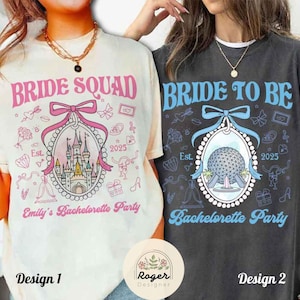 May include: Two t-shirts with bachelorette party designs. One is cream-colored with "Bride Squad" in pink, a castle graphic, and "Emily's Bachelorette Party." The other is charcoal gray with "Bride to Be" in blue and a globe graphic.
