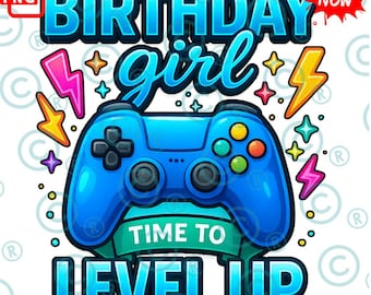 May include: A vibrant graphic featuring a blue video game controller with the words "BIRTHDAY girl TIME TO LEVEL UP". The design includes lightning bolts, stars, and a banner. The overall theme is gaming and birthdays.