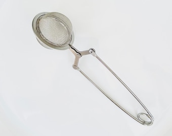 Tetera de acero inoxidable con asa