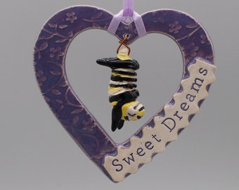 handmade ceramic monarch caterpillar ornament