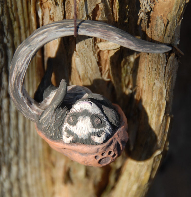 Sleeping ferret walnut ornament image 3