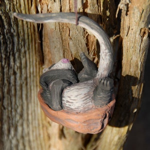 Sleeping ferret walnut ornament image 2
