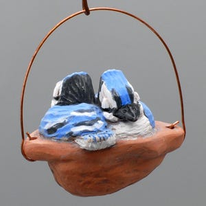 sleeping baby blue jays ornament