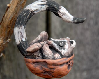Sleeping Raccoon Walnut Ornament