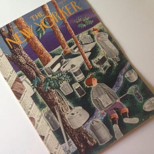 May include: Vintage cover of The New Yorker magazine featuring an illustration of a fishing scene. The cover art includes the magazine's title in gold lettering, a person in a coat, trees, and fishing gear.