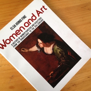 May include: A book titled "Women and Art" by Elsa Honig Fine. The cover features a painting of a woman in a green and white dress, set against a red background. The book's subtitle reads: "A history of women painters and sculptors from the Renaissance to the 20th century."