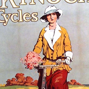 May include: A vintage advertisement for King Cycles featuring a woman in a white hat and yellow jacket riding a bicycle. The woman is holding a bouquet of pink flowers and is smiling. The text "King Cycles" is in large, bold letters at the top of the advertisement.