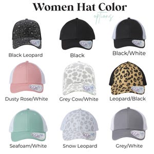 May include: A grid of nine baseball caps in various colors and patterns. The caps include black leopard, black, black/white, dusty rose/white, grey cow/white, leopard/black, seafoam/white, snow leopard, and grey/white. The text "Women Hat Color Options" is at the top.