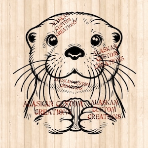 May include: Black and white line art illustration of an otter's face with a smiling expression. The otter is holding its paws together in front of its chest. The text "Alaskan Custom Creations" is repeated throughout the image.