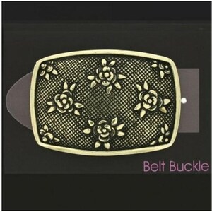 May include: Rectangular antique gold belt buckle with a floral design. The buckle features a mesh background with raised rose and leaf details. The words "Belt Buckle" are printed in a pink font.