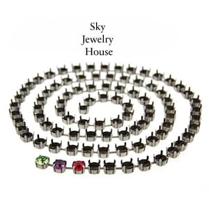 May include: A coiled strand of silver-toned metal settings, each designed to hold a gemstone. The strand features a few colorful gemstones: green, purple, and red. The text "Sky Jewelry House" is at the top.