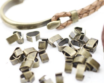 50 sertissage en métal bronze antique, sertissage rabattable, sertissage du cordon, fermeture à sertir, perles à écraser en cuir, fournitures pour fabrication de bijoux, vente en gros ZM318ab